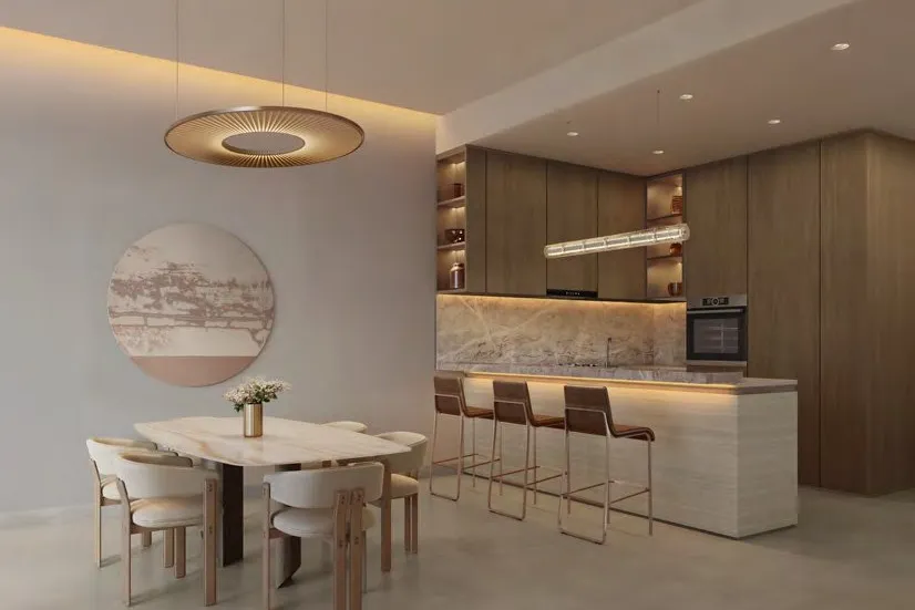 Oak kitchen with breakfast bar beside a stone dining table